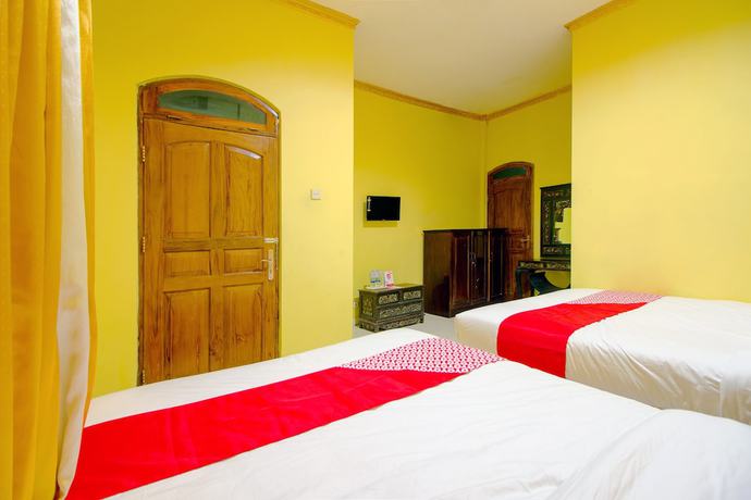 Imagen de la habitación del Hotel OYO 1770 Mawar Saron 2. Foto 16
