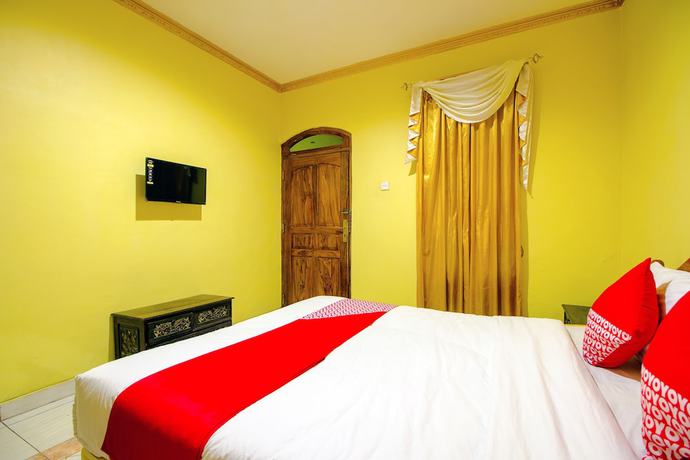 Imagen de la habitación del Hotel OYO 1770 Mawar Saron 2. Foto 17