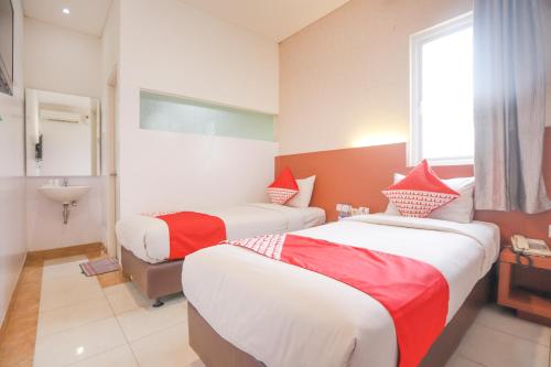 Imagen de la habitación del Hotel OYO 180 Mirah. Foto 5