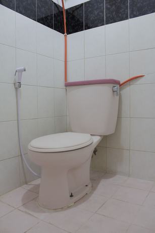 Imagen de la habitación del Hotel OYO 181 Wisma Bintang. Foto 9