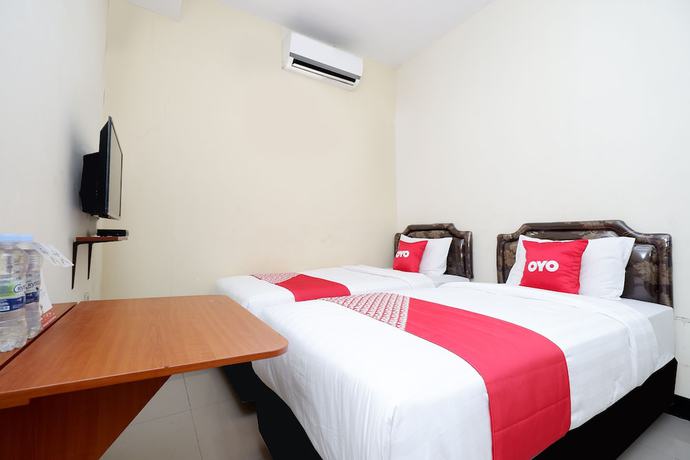 Imagen de la habitación del Hotel OYO 1815 Gatsu Residence. Foto 2
