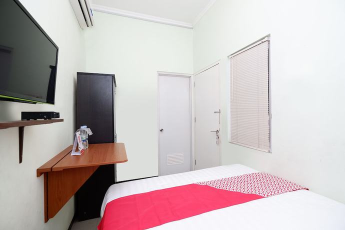 Imagen de la habitación del Hotel OYO 1815 Gatsu Residence. Foto 8