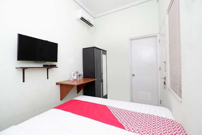 Imagen de la habitación del Hotel OYO 1815 Gatsu Residence. Foto 10