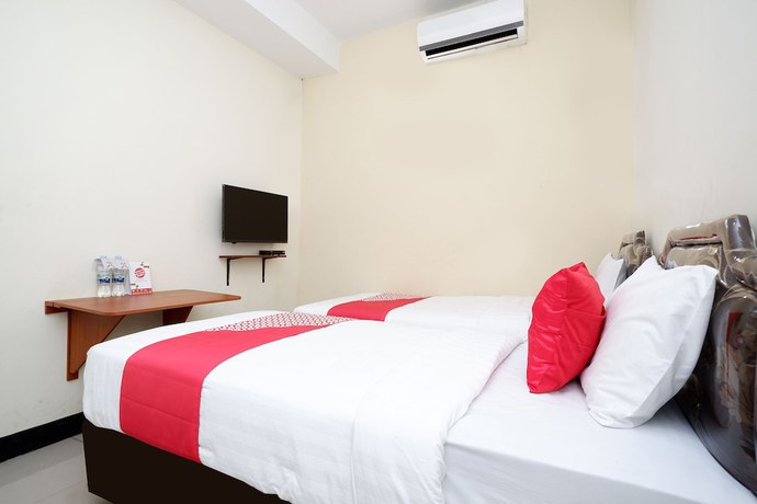 Imagen de la habitación del Hotel OYO 1815 Gatsu Residence. Foto 11