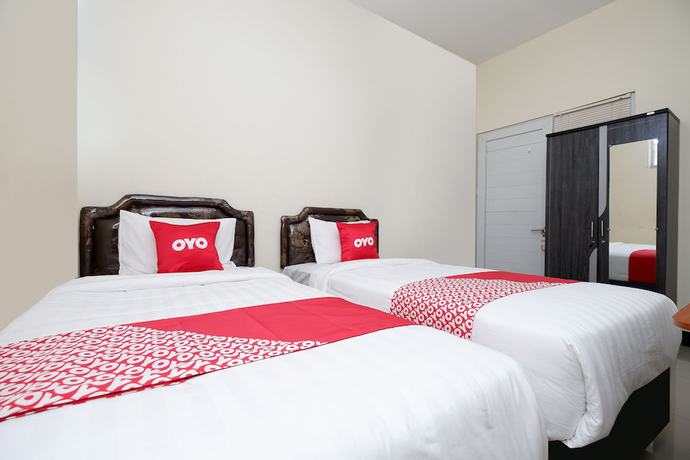 Imagen de la habitación del Hotel OYO 1815 Gatsu Residence. Foto 13