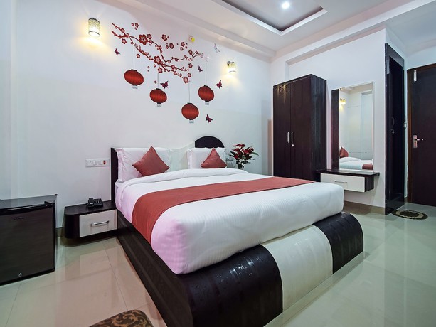 Imagen de la habitación del Hotel OYO 18262 White Tulip. Foto 15