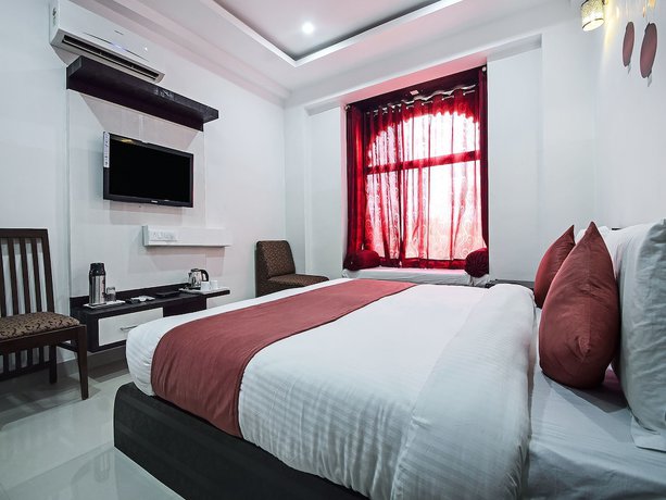 Imagen de la habitación del Hotel OYO 18262 White Tulip. Foto 16