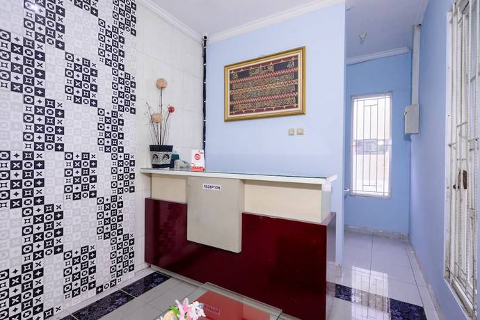 Imagen de los interiores del Hotel OYO 1829 Zaira House. Foto 12
