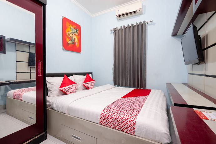 Imagen de la habitación del Hotel OYO 1829 Zaira House. Foto 8