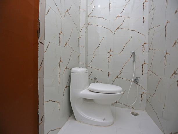 Imagen de la habitación del Hotel OYO 18362 Jai Maa Durga. Foto 8
