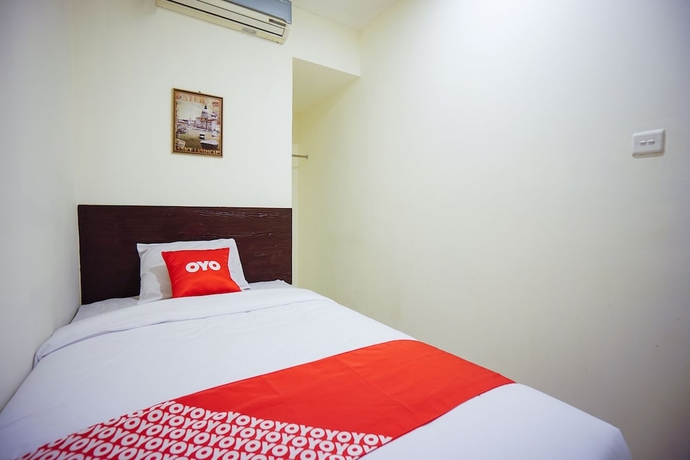 Imagen de la habitación del Hotel OYO 1838 COZY Home. Foto 2