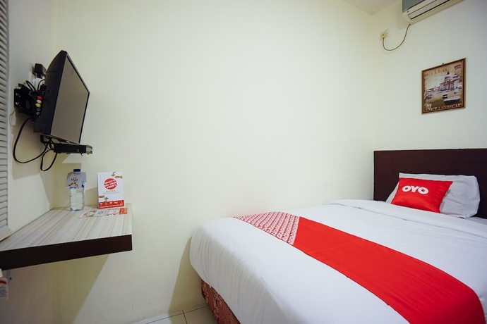Imagen de la habitación del Hotel OYO 1838 COZY Home. Foto 3
