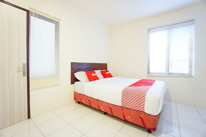 Imagen de la habitación del Hotel OYO 1838 COZY Home. Foto 4