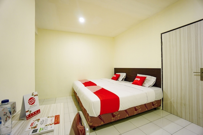Imagen de la habitación del Hotel OYO 1838 COZY Home. Foto 5
