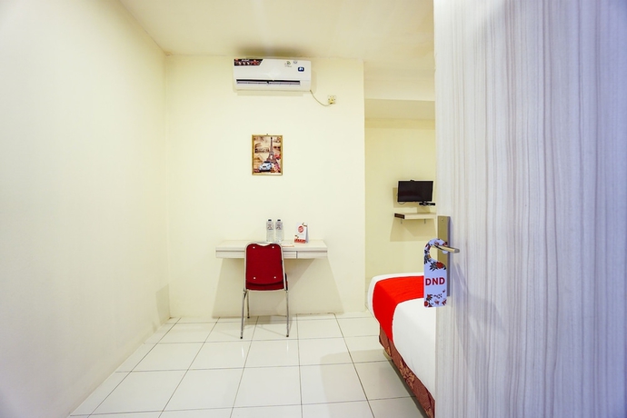 Imagen de la habitación del Hotel OYO 1838 COZY Home. Foto 6