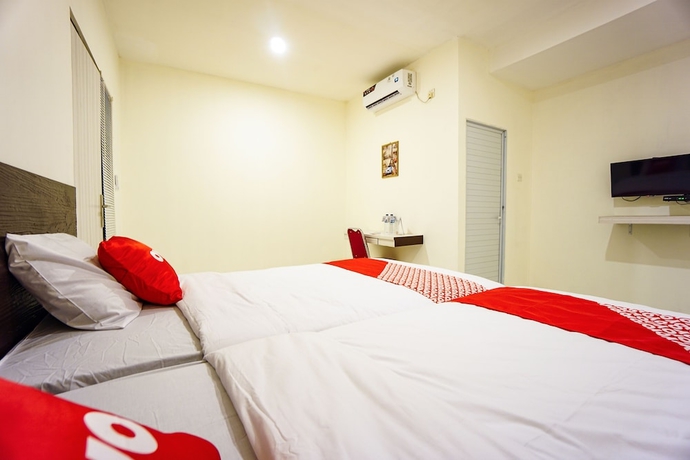 Imagen de la habitación del Hotel OYO 1838 COZY Home. Foto 10