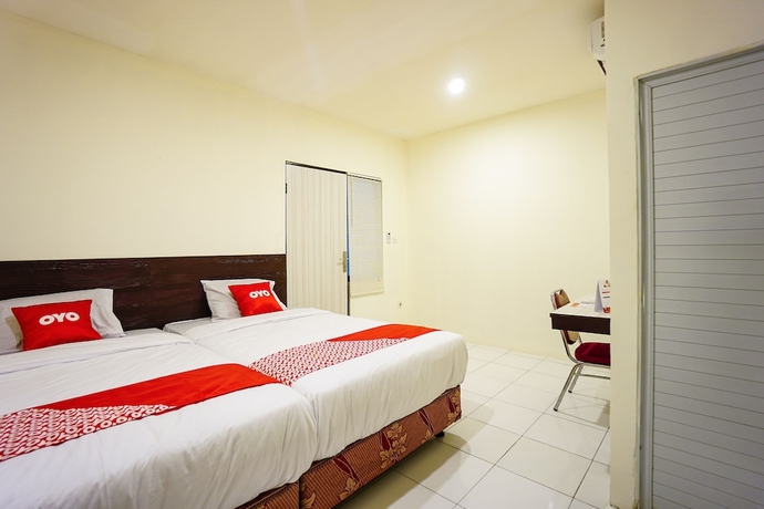 Imagen de la habitación del Hotel OYO 1838 COZY Home. Foto 11