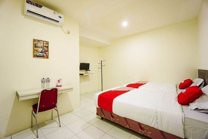 Imagen de la habitación del Hotel OYO 1838 COZY Home. Foto 12