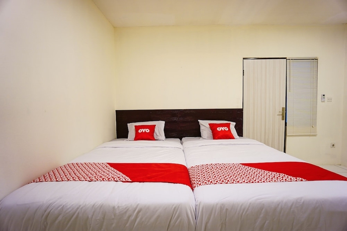 Imagen de la habitación del Hotel OYO 1838 COZY Home. Foto 13