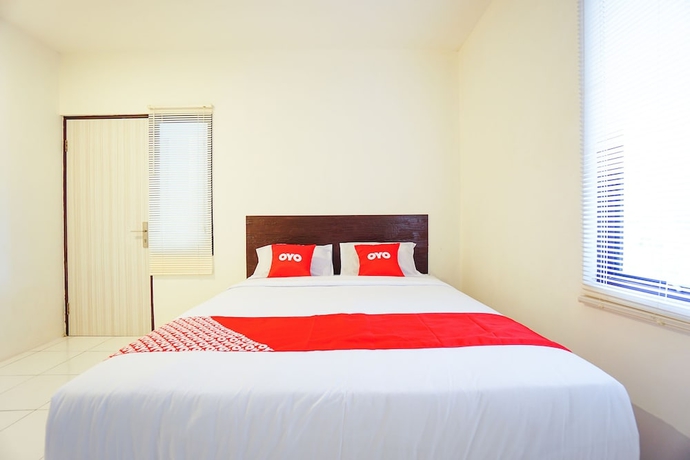 Imagen de la habitación del Hotel OYO 1838 COZY Home. Foto 14
