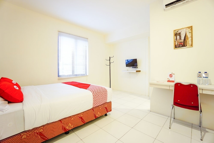 Imagen de la habitación del Hotel OYO 1838 COZY Home. Foto 15