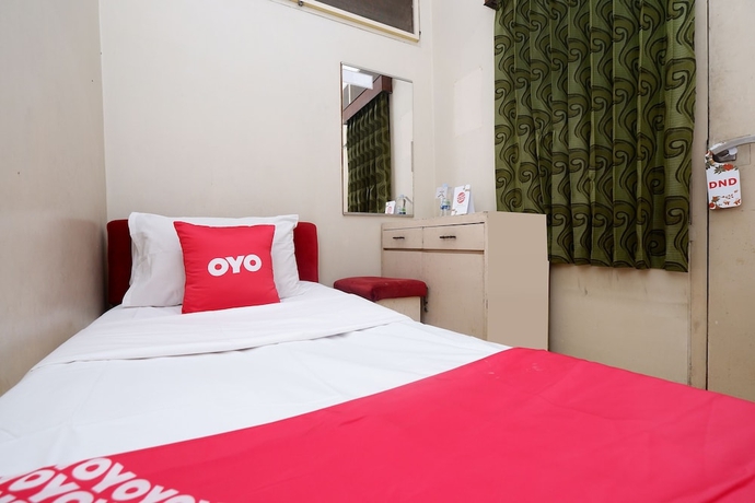 Imagen de la habitación del Hotel OYO 1843 Cahya Nirwana. Foto 8