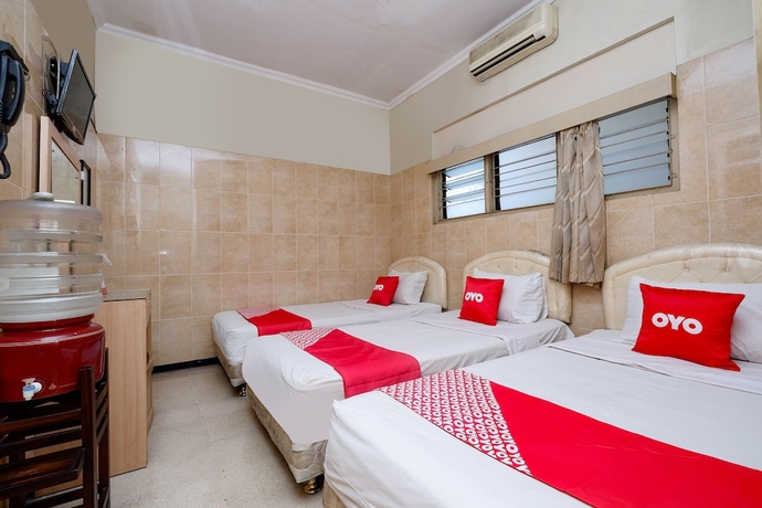 Imagen de la habitación del Hotel OYO 1843 Cahya Nirwana. Foto 10