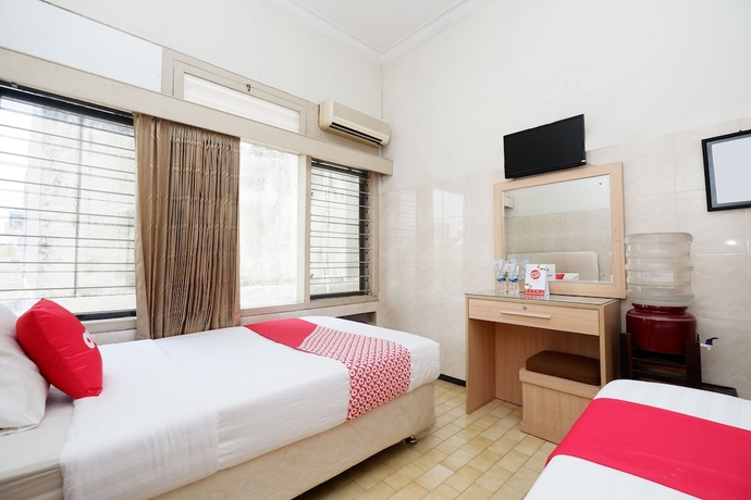 Imagen de la habitación del Hotel OYO 1843 Cahya Nirwana. Foto 14
