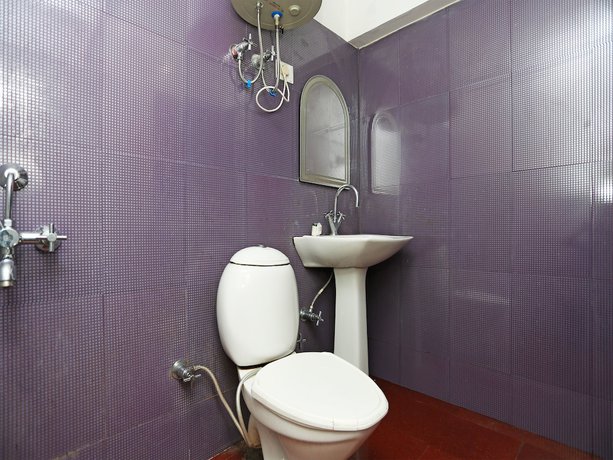 Imagen de la habitación del Hotel OYO 18568 Ratan. Foto 10