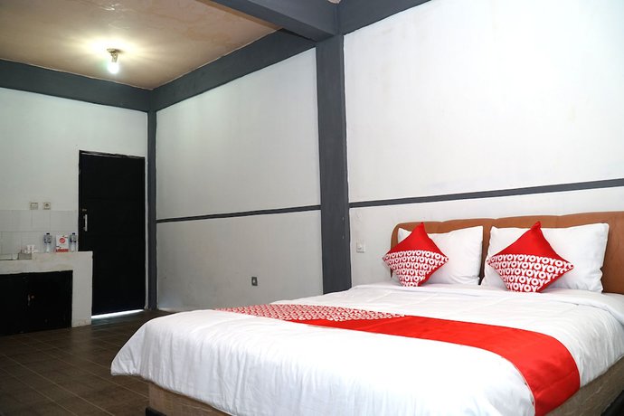 Imagen de la habitación del Hotel OYO 1861 Martha Guest House. Foto 2