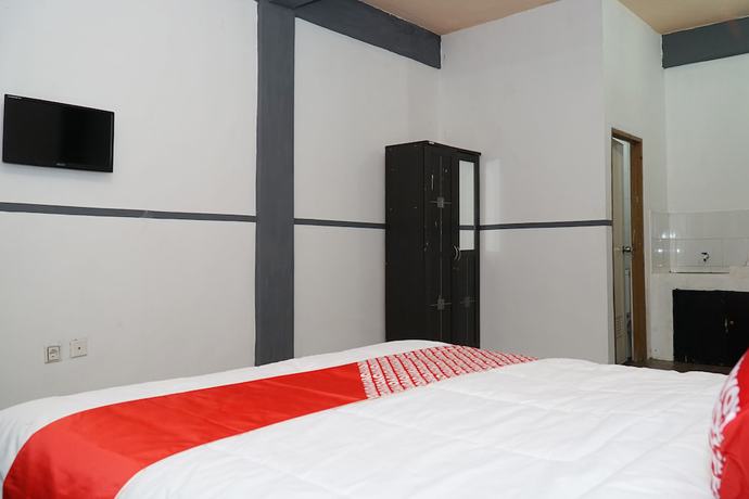 Imagen de la habitación del Hotel OYO 1861 Martha Guest House. Foto 5