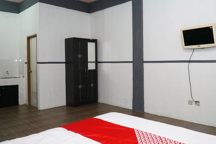 Imagen de la habitación del Hotel OYO 1861 Martha Guest House. Foto 7