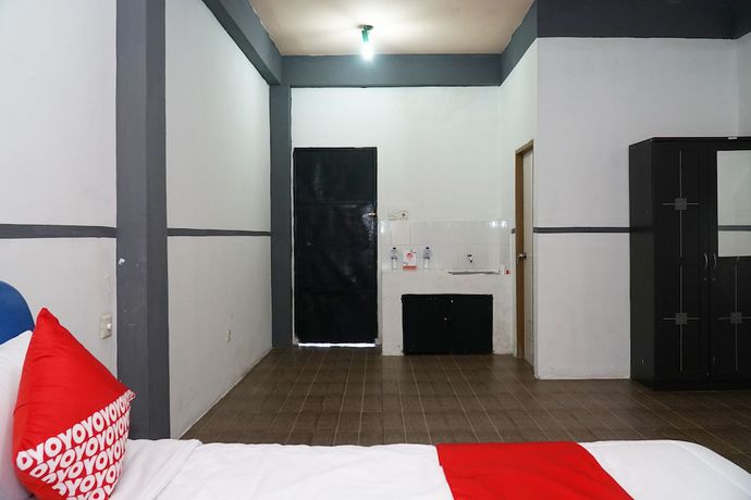 Imagen de la habitación del Hotel OYO 1861 Martha Guest House. Foto 8