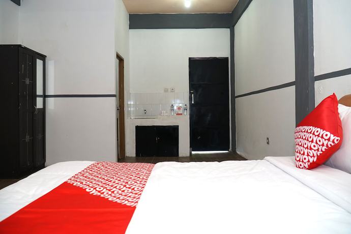 Imagen de la habitación del Hotel OYO 1861 Martha Guest House. Foto 13