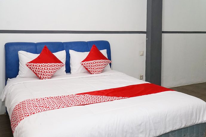 Imagen de la habitación del Hotel OYO 1861 Martha Guest House. Foto 14