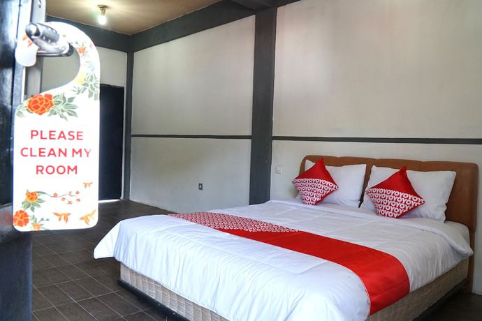 Imagen de la habitación del Hotel OYO 1861 Martha Guest House. Foto 15
