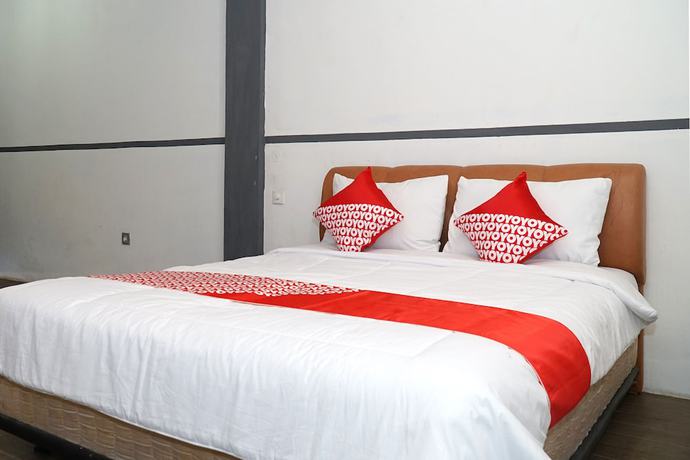 Imagen de la habitación del Hotel OYO 1861 Martha Guest House. Foto 16