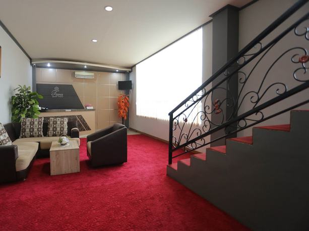 Imagen de los interiores del Hotel OYO 1864 Tiara Guest House. Foto 17