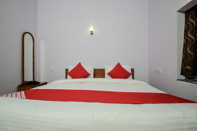 Imagen de la habitación del Hotel OYO 18671 Ashirwad Palace. Foto 6