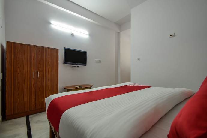 Imagen de la habitación del Hotel OYO 18671 Ashirwad Palace. Foto 7
