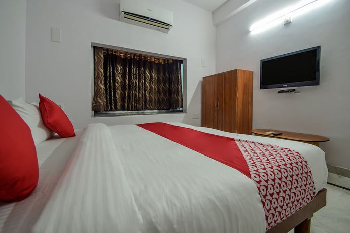 Imagen de la habitación del Hotel OYO 18671 Ashirwad Palace. Foto 8