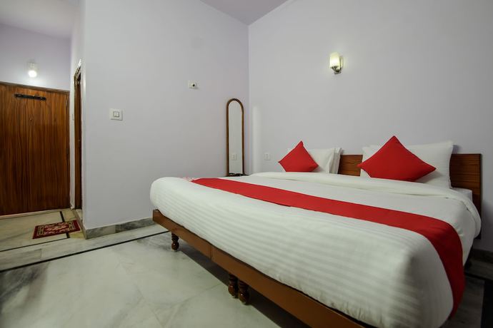 Imagen de la habitación del Hotel OYO 18671 Ashirwad Palace. Foto 10