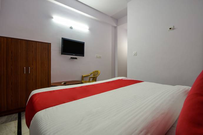 Imagen de la habitación del Hotel OYO 18671 Ashirwad Palace. Foto 11