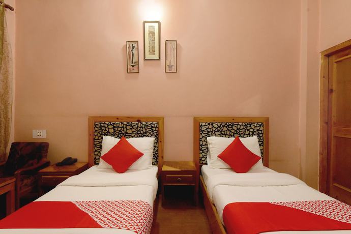 Imagen de la habitación del Hotel OYO 18674 Airport Inn. Foto 12