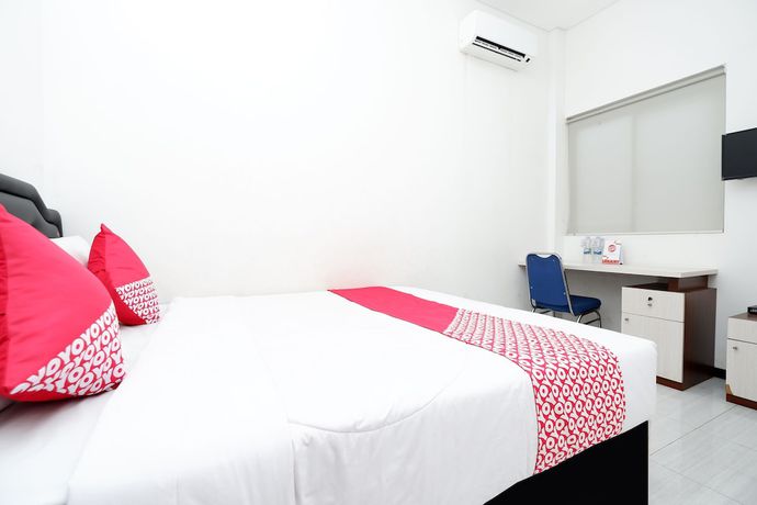 Imagen de la habitación del Hotel OYO 1884 Sunshine Hostel. Foto 9
