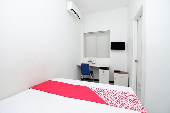 Imagen de la habitación del Hotel OYO 1884 Sunshine Hostel. Foto 10