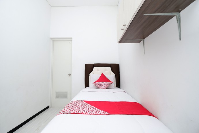Imagen de la habitación del Hotel OYO 1884 Sunshine Hostel. Foto 11