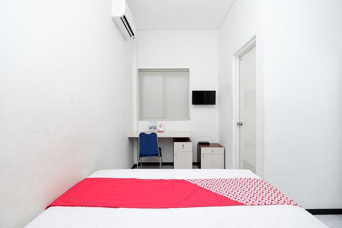 Imagen de la habitación del Hotel OYO 1884 Sunshine Hostel. Foto 12