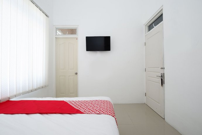 Imagen de la habitación del Hotel OYO 1888 Griya RW Family Guest House. Foto 4