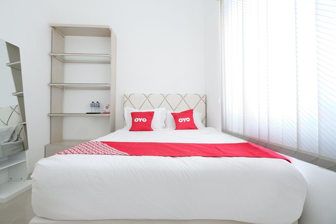 Imagen de la habitación del Hotel OYO 1888 Griya RW Family Guest House. Foto 5